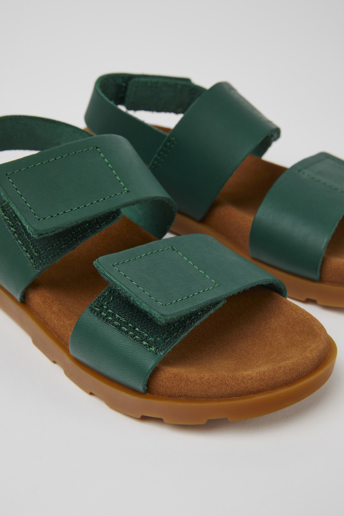 Close-up view of Brutus Sandal Green leather sandals for kids