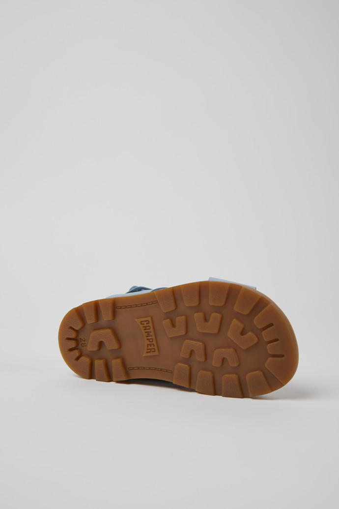 The soles of Brutus Sandal Blue leather sandals for kids