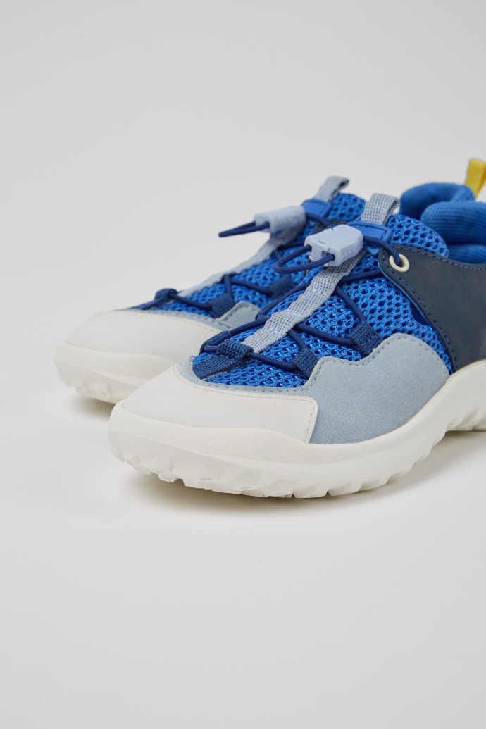 Close-up view of CRCLR Blue and white  sneakers for kids