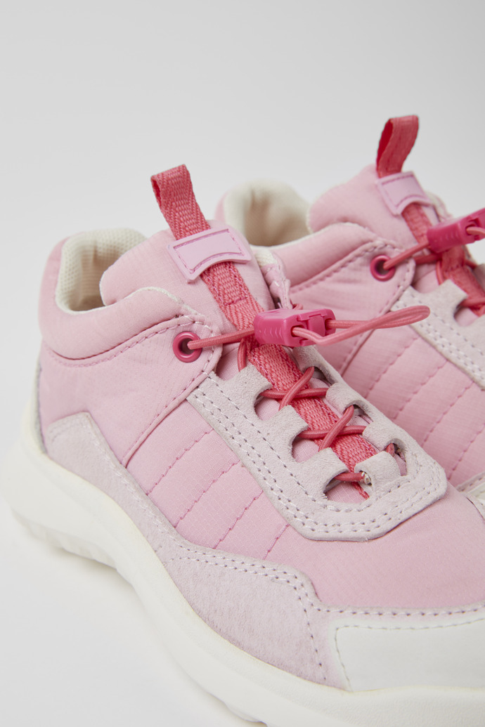Close-up view of CRCLR Pink and white sneakers for girls
