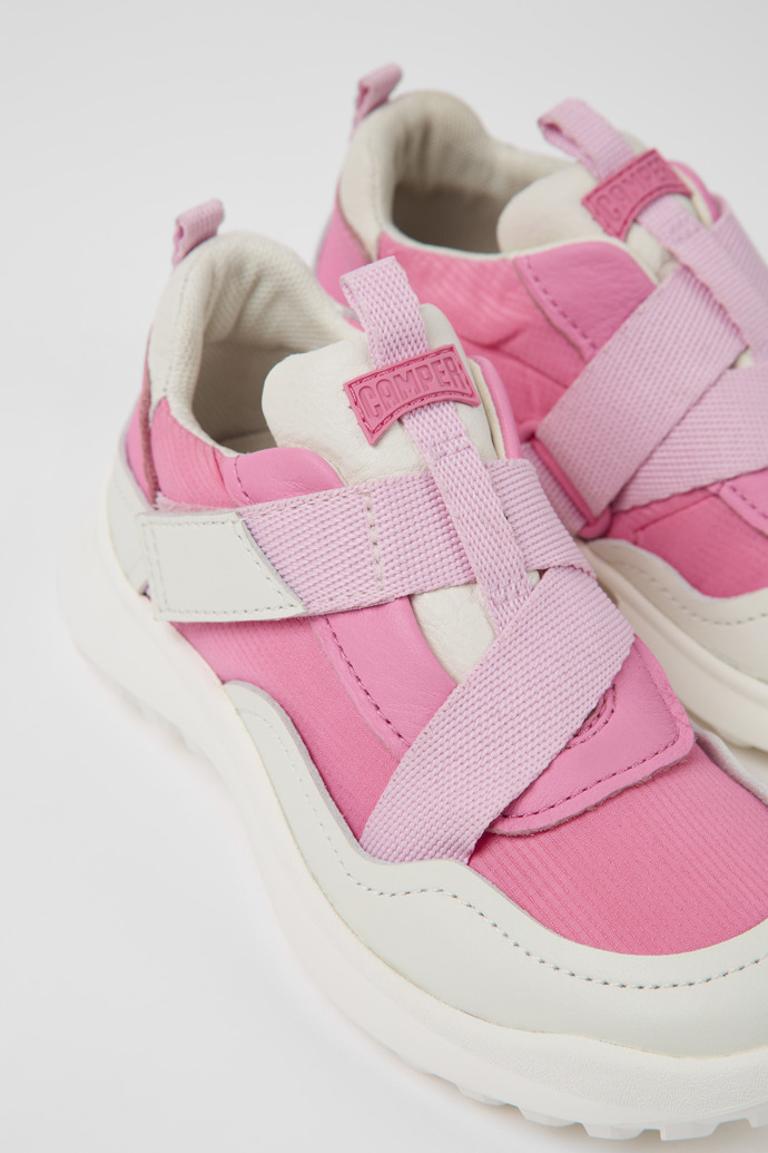 Close-up view of CRCLR Pink leather and textile sneakers for kids