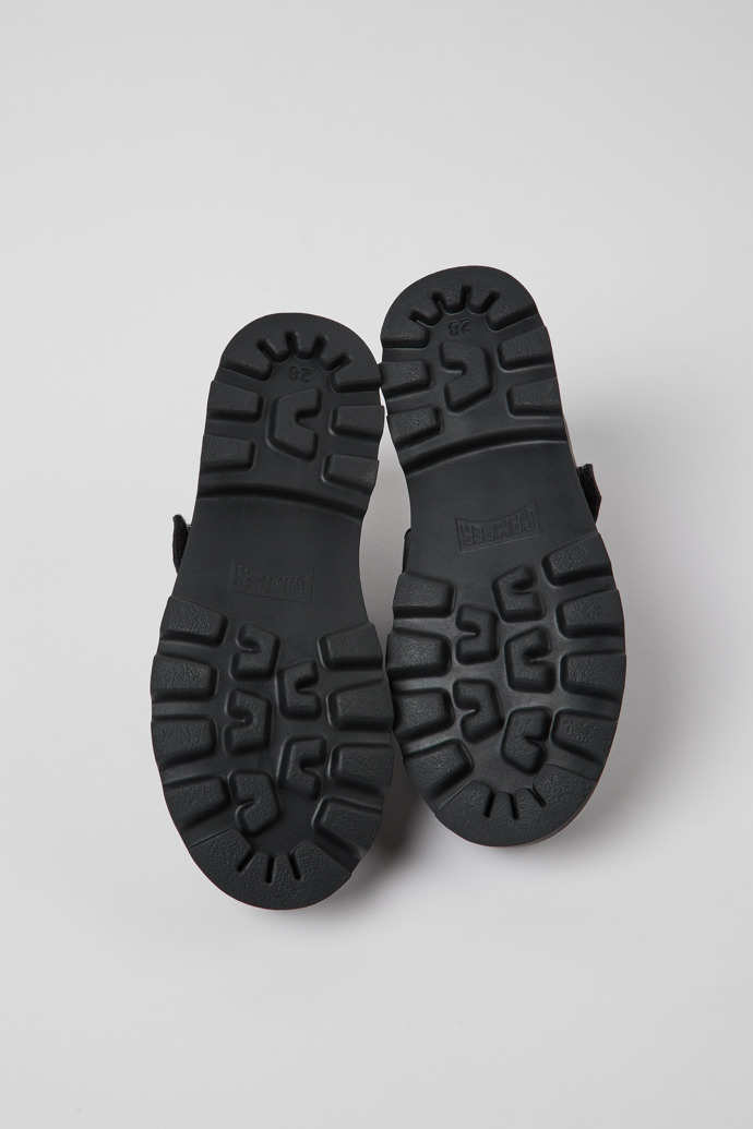 The soles of Brutus Black leather Mary Jane shoes for kids