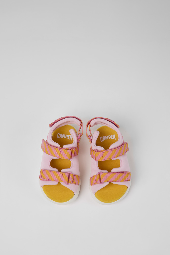 Overhead view of Oruga Pink and orange textile sandals for kids