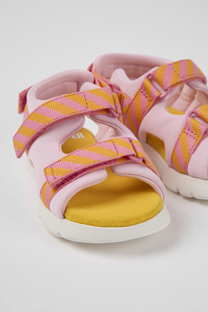 Close-up view of Oruga Pink and orange textile sandals for kids
