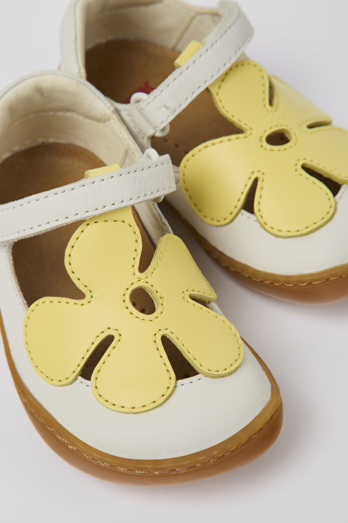 Close-up view of Twins White and yellow leather shoes for kids