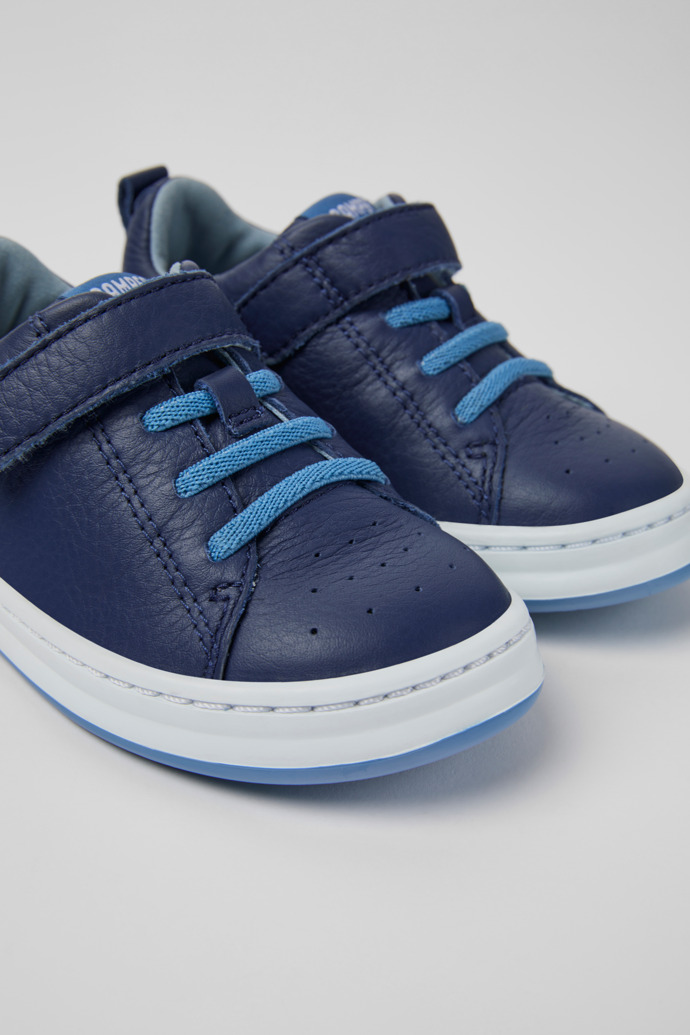 Close-up view of Runner Blue leather sneakers for kids