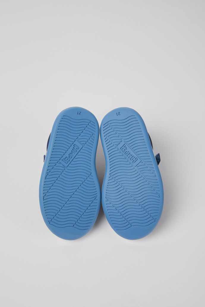 The soles of Runner Blue leather sneakers for kids