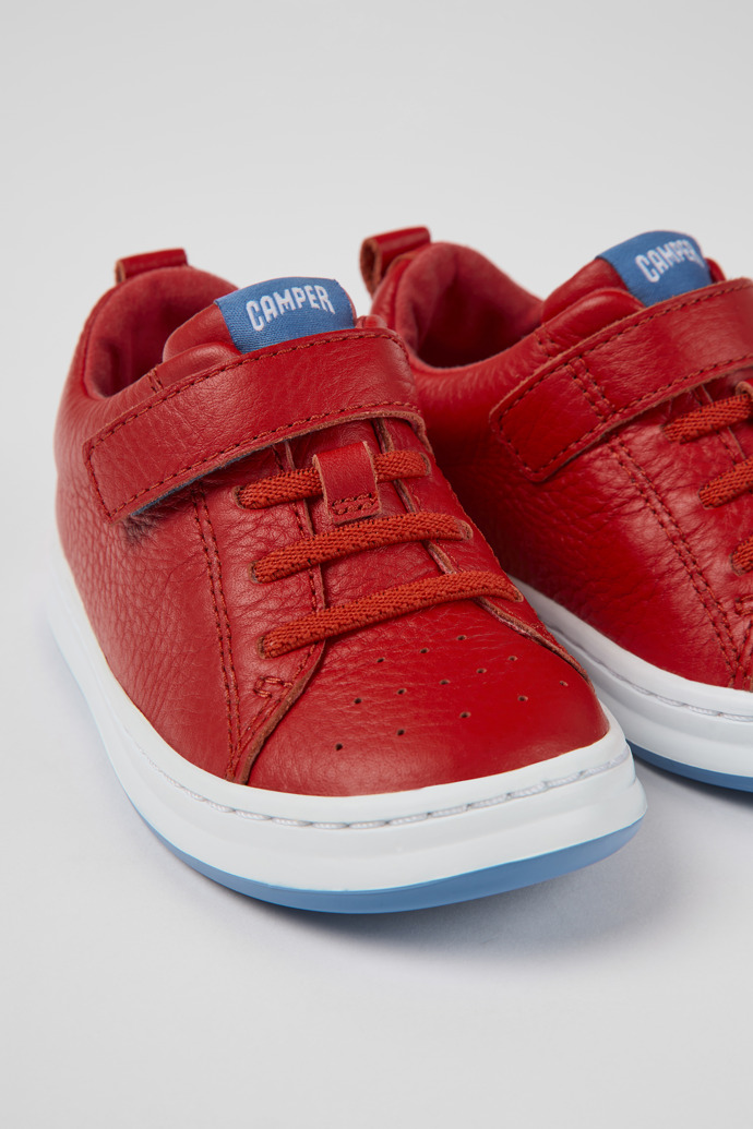 Close-up view of Runner Red leather sneakers for kids