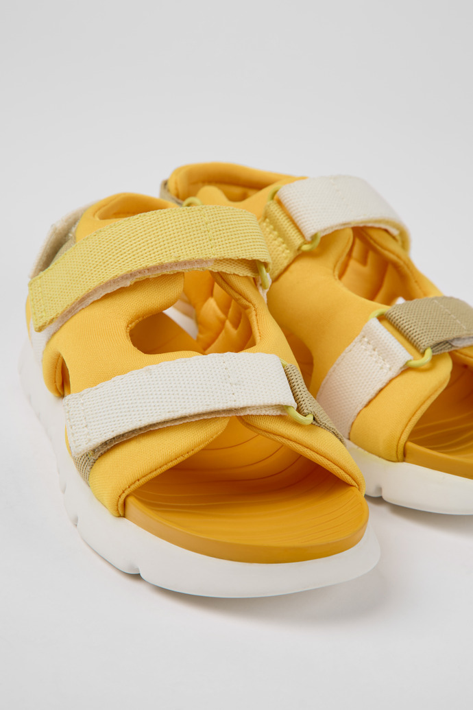 Close-up view of Twins Orange textile sandals for kids