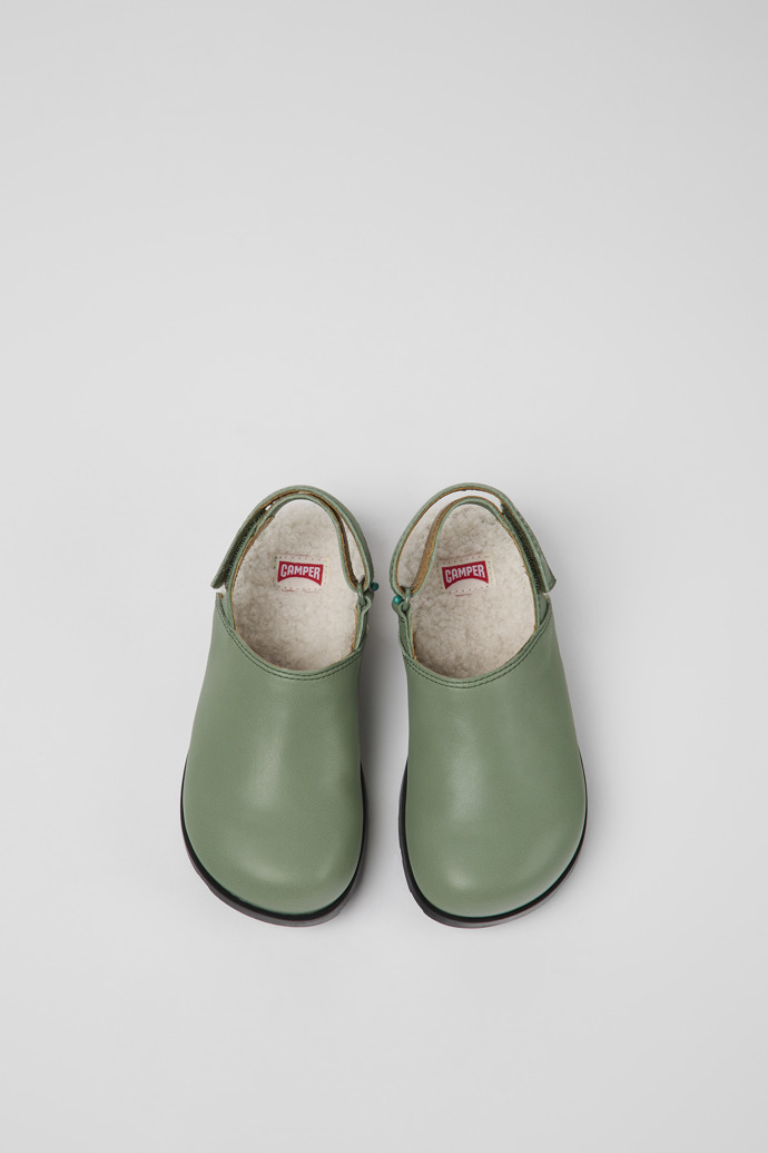 Overhead view of Brutus Green leather clogs for kids