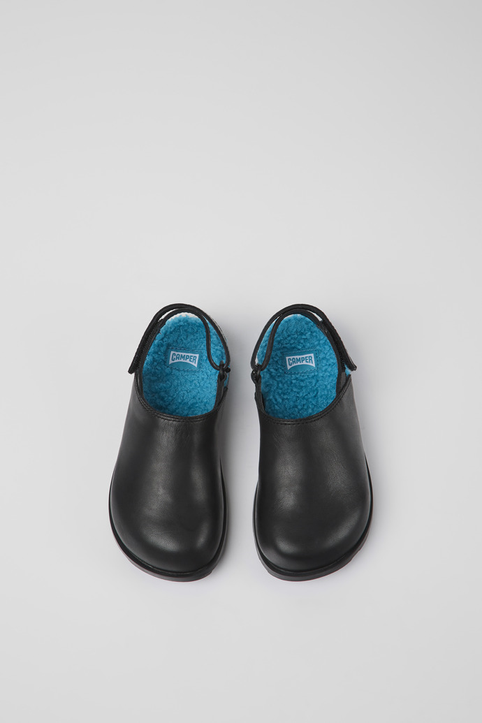 Overhead view of Brutus Black leather clogs for kids