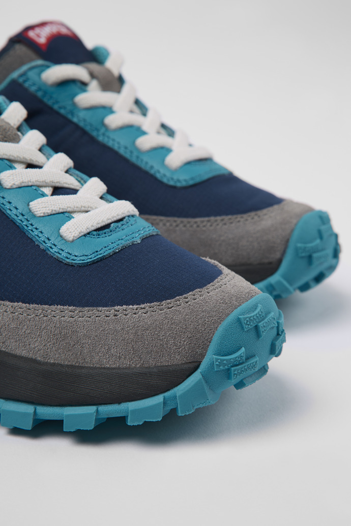 Close-up view of Drift Trail Blue textile and leather sneakers for kids