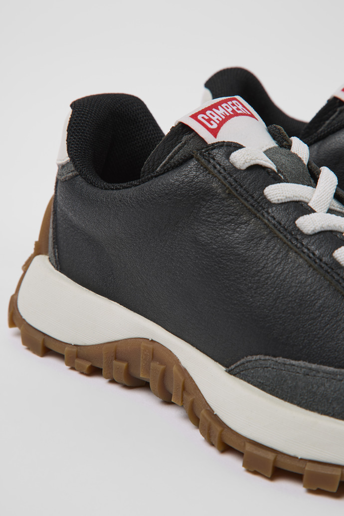Close-up view of Drift Trail Black leather and nubuck sneakers for kids