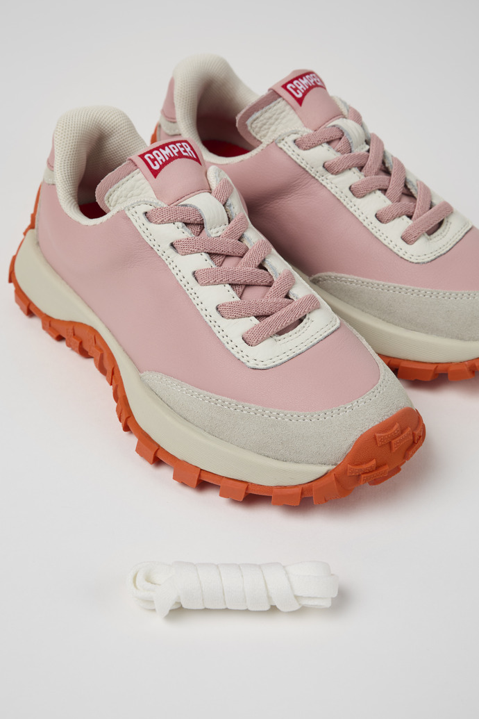 Close-up view of Drift Trail Pink and gray leather and nubuck sneaker