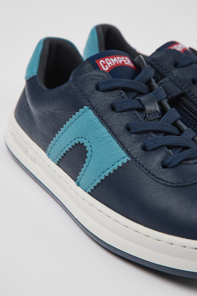 Close-up view of Runner Dark blue leather sneakers for kids