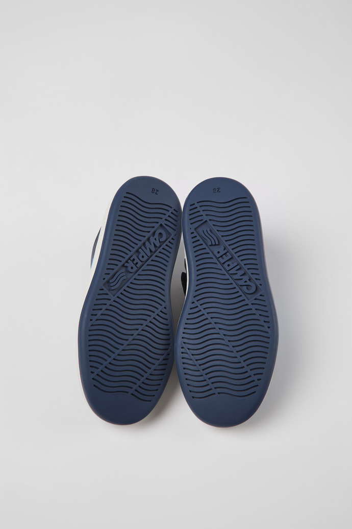 The soles of Runner Dark blue leather sneakers for kids