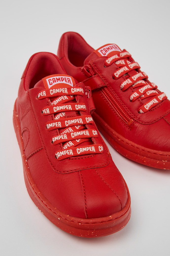 Close-up view of Runner Red Leather Sneakers for Kids.