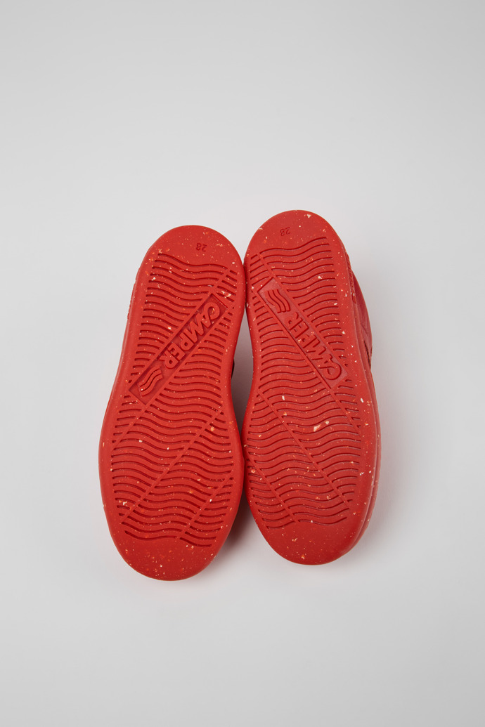 The soles of Runner Red Leather Sneakers for Kids.