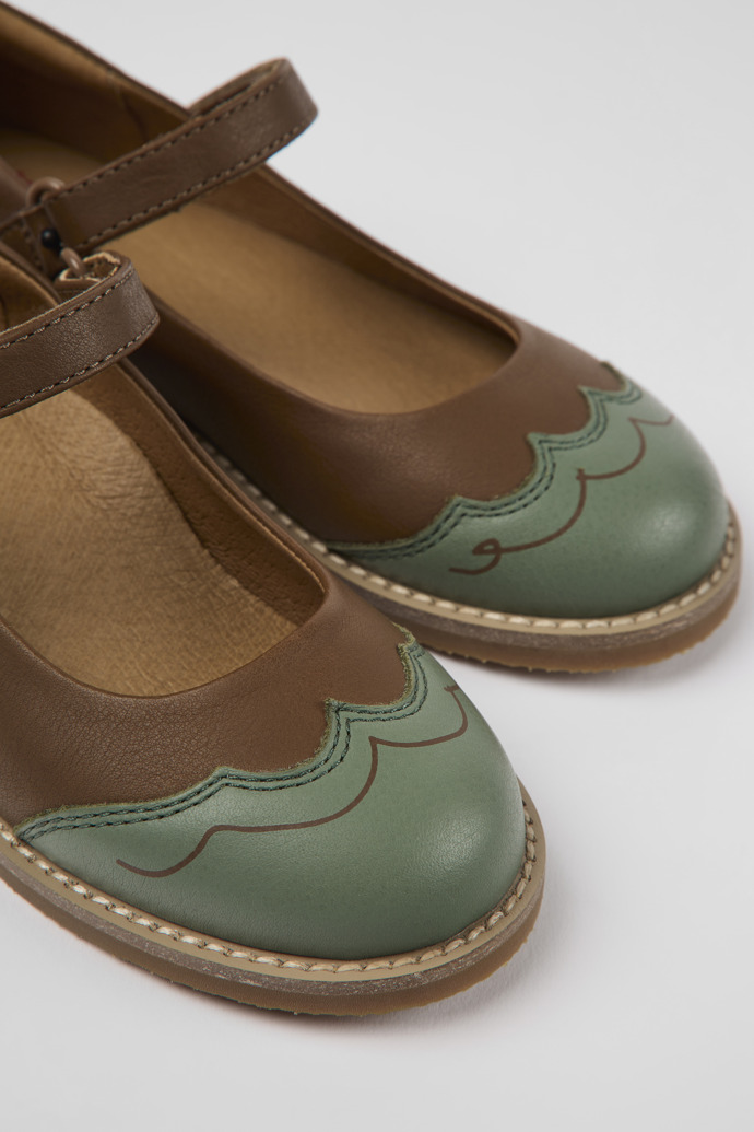 Close-up view of Twins Brown and green leather ballerinas for kids