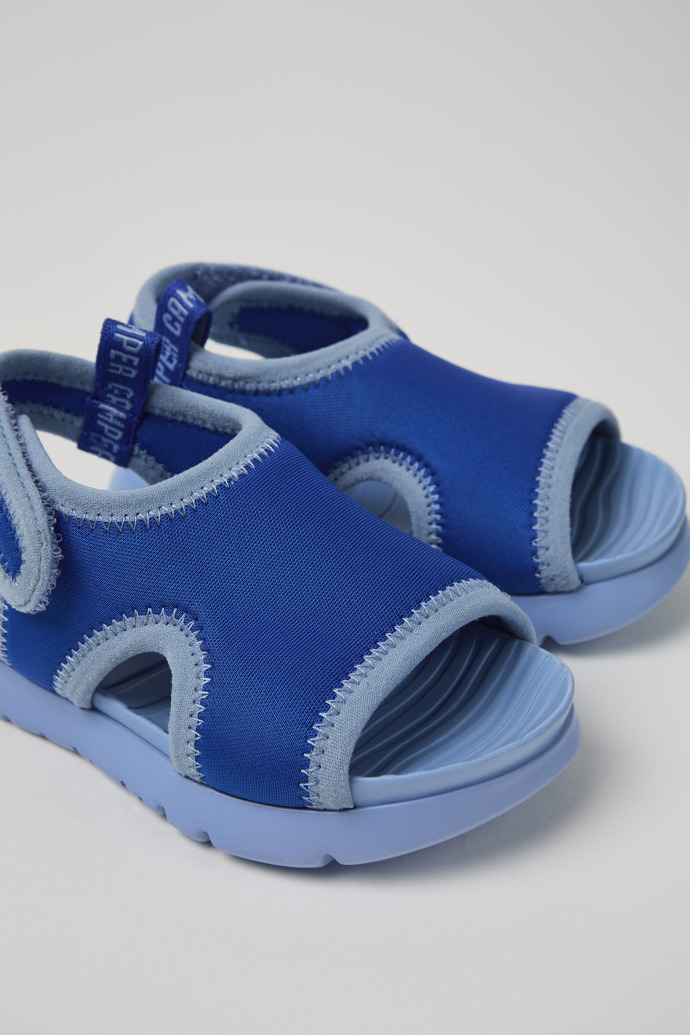 Close-up view of Oruga Blue Textile Sandal