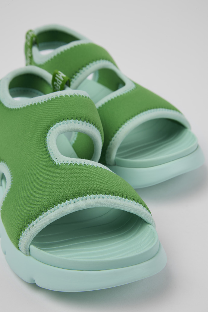 Close-up view of Oruga Green Textile Sandal