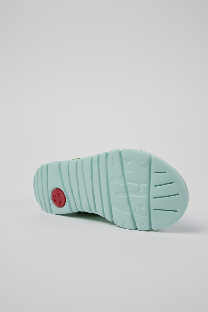 The soles of Oruga Green Textile Sandal