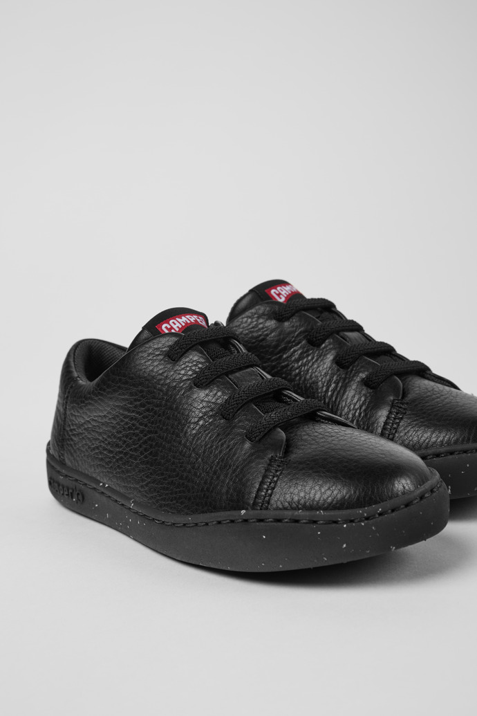 Close-up view of Peu Touring Black leather sneakers for kids