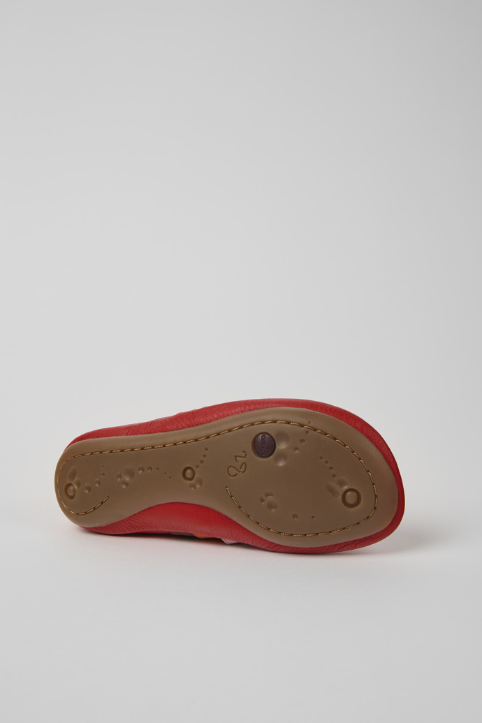 The soles of Twins Red leather ballerinas for kids