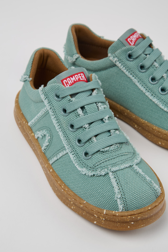 Close-up view of Runner Green Recycled Cotton Sneakers for Kids.