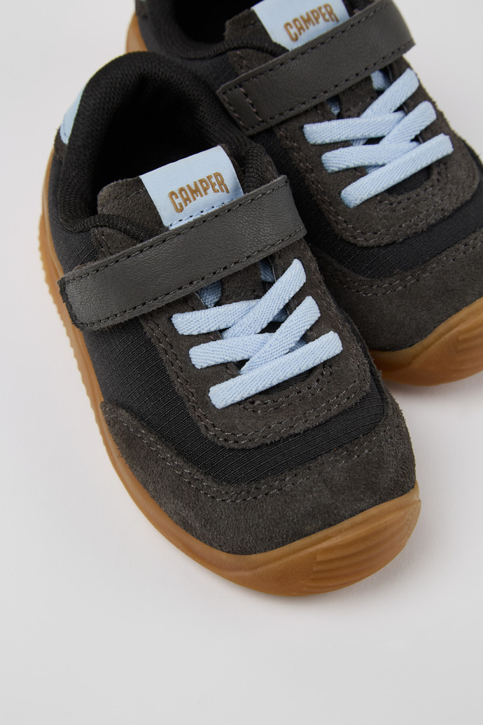 Close-up view of Dadda Black textile and nubuck sneakers for kids