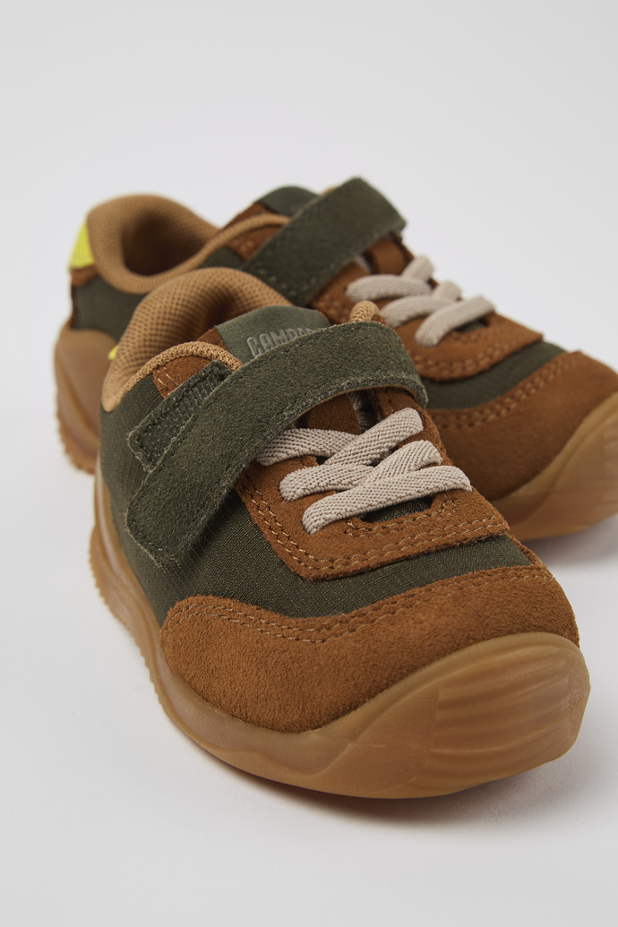 Close-up view of Dadda Green textile and nubuck sneakers for kids