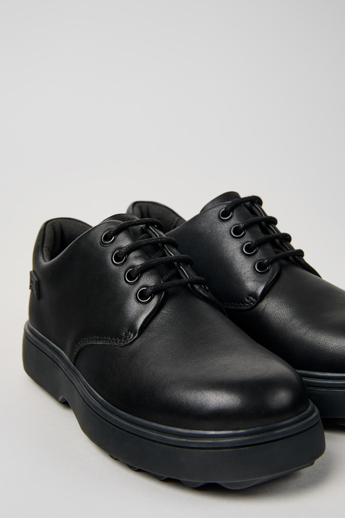 Close-up view of Norte Black leather lace-up shoes for kids