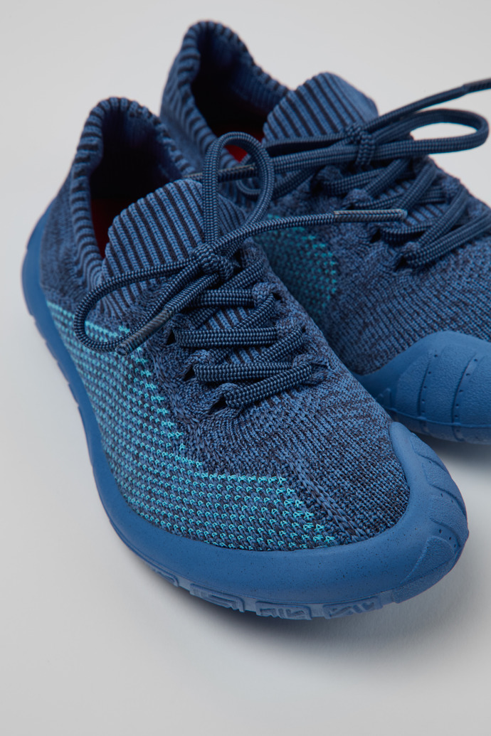 Close-up view of Peu Blue Simplified Knit Uppers Kids' Sneakers.