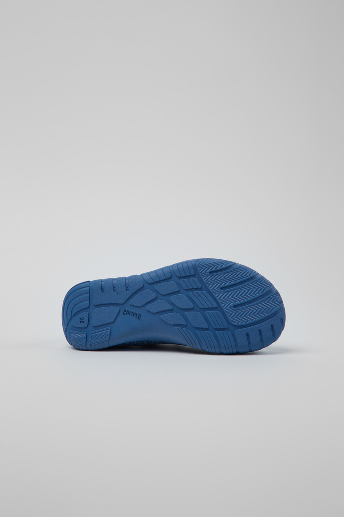 The soles of Peu Blue Simplified Knit Uppers Kids' Sneakers.