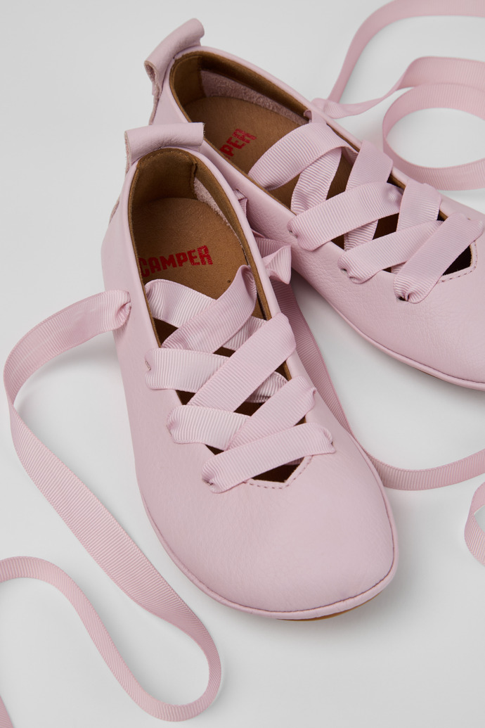 Close-up view of Right Pink Leather Ballerinas for kids.