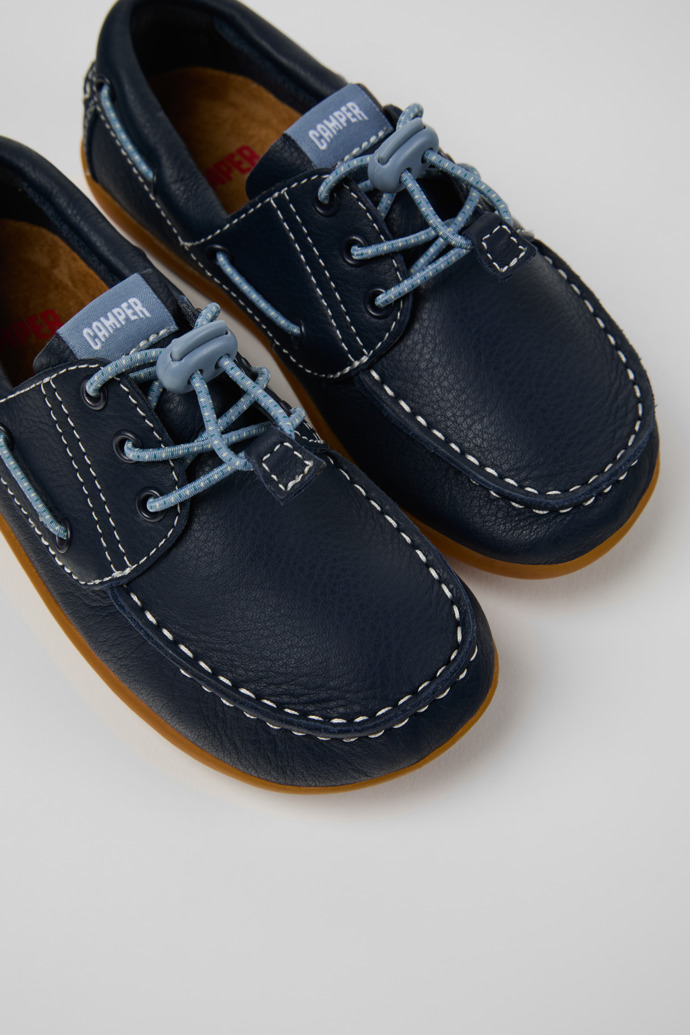 Close-up view of Peu Blue Leather Nautical Shoes for kids.