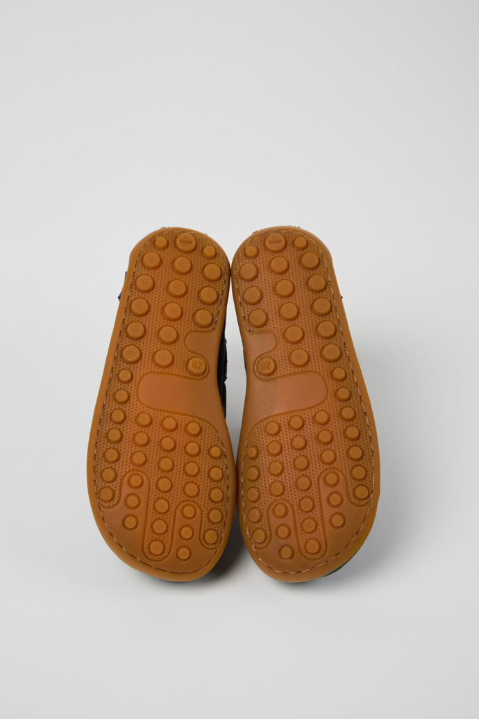 The soles of Peu Blue Leather Nautical Shoes for kids.