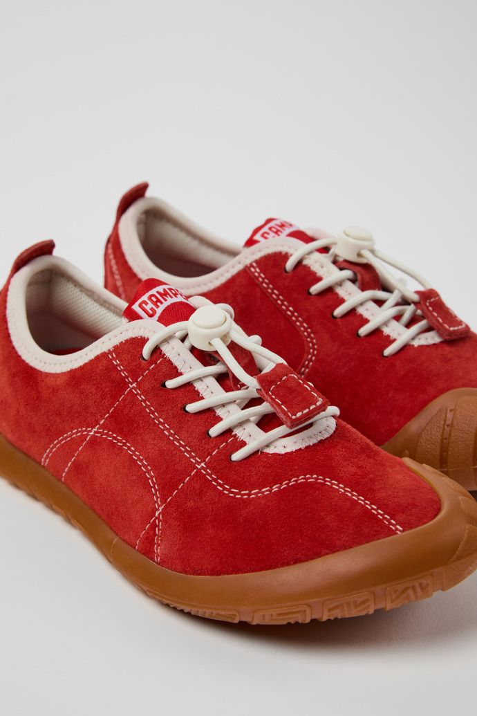 Close-up view of Peu Path Red Nubuck Sneakers for kids.