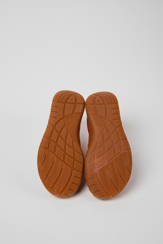 The soles of Peu Path Red Nubuck Sneakers for kids.