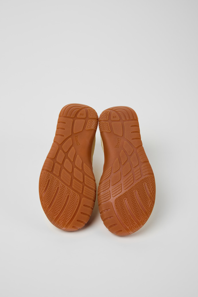 The soles of Twins Yellow Nubuck Sneakers for kids.