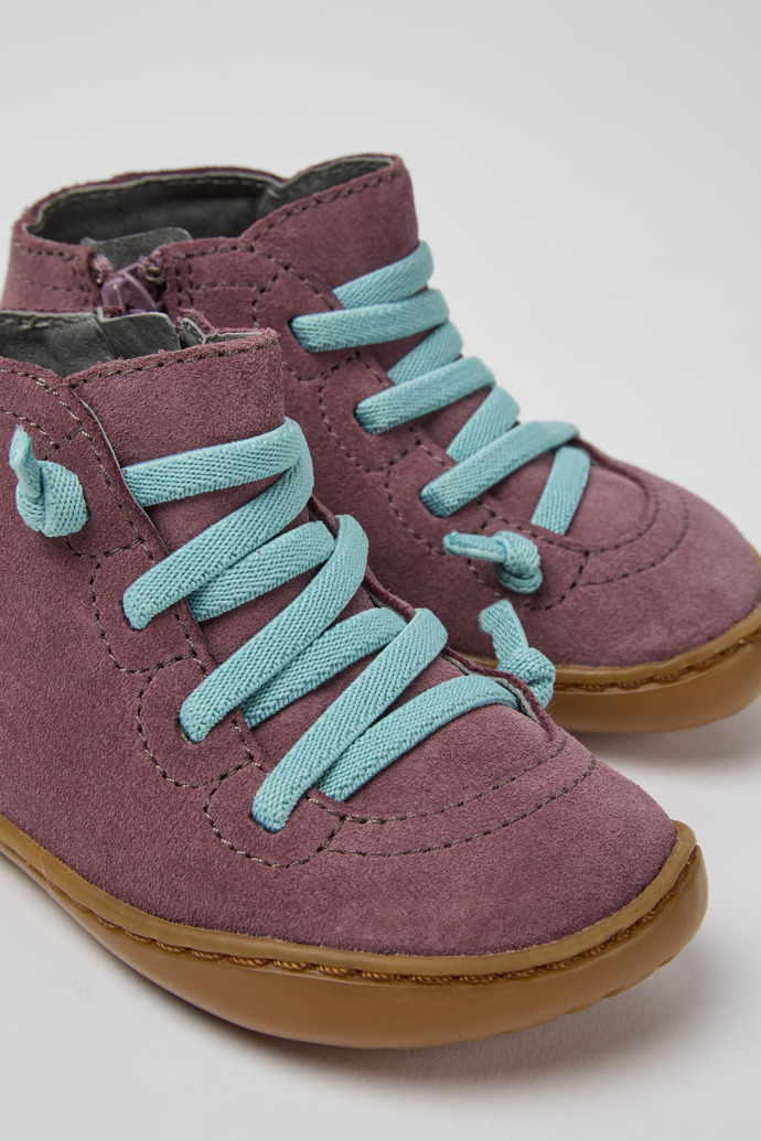 Close-up view of Peu Violet nubuck ankle boots