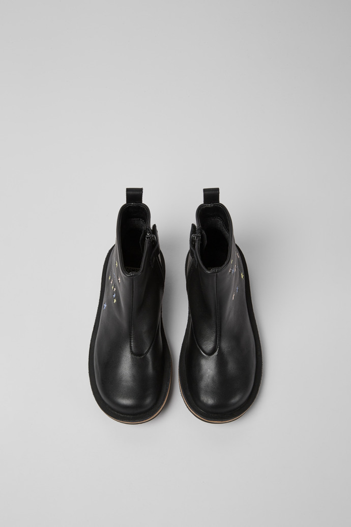 Overhead view of Twins Black leather boots
