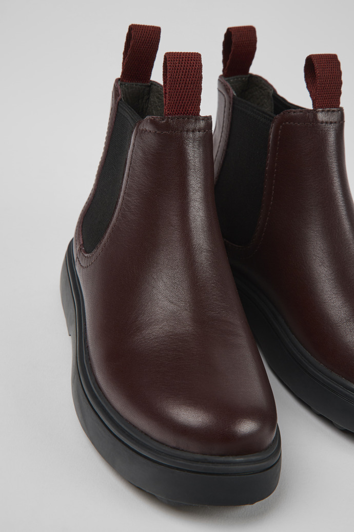 Close-up view of Norte Burgundy leather Chelsea boots for kids