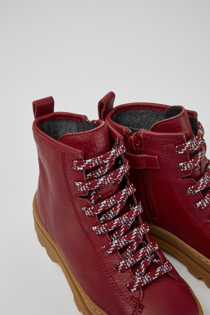 Close-up view of Brutus Red lace up leather boots
