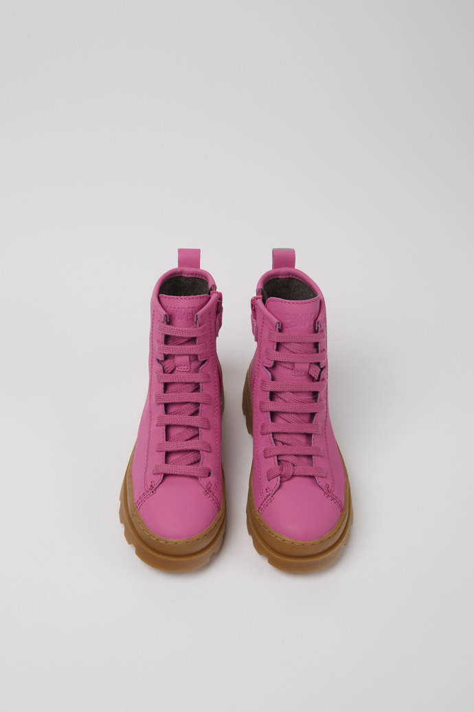 Overhead view of Brutus Pink leather lace-up boots