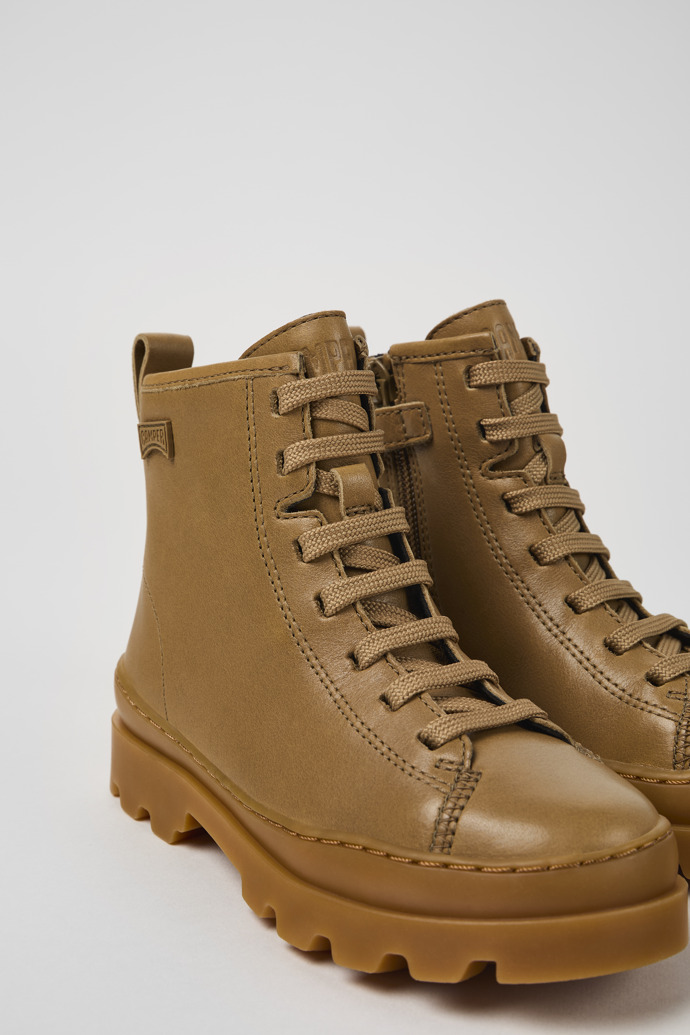 Close-up view of Brutus Brown leather ankle boots for kids