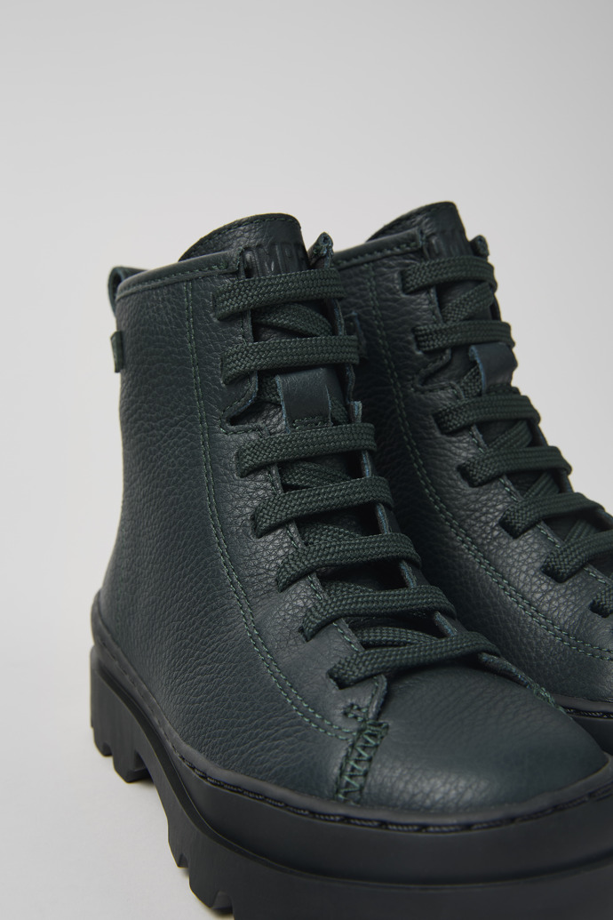 Close-up view of Brutus Dark green leather ankle boots for kids