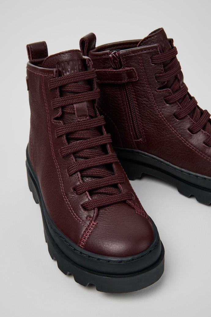 Close-up view of Brutus Burgundy Leather Ankle Boots for Kids.