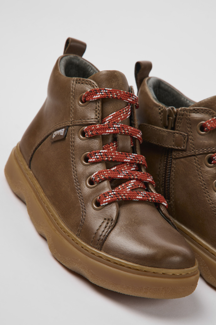 Close-up view of Kido Brown leather ankle boots for kids