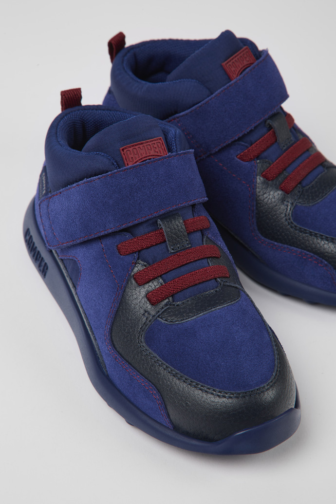 Close-up view of Driftie Navy blue nubuck and textile ankle boots